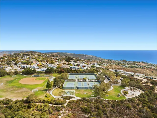 Alta Laguna Park with breathtaking views, tennis and pickleball courts, sports fields, and a playground.