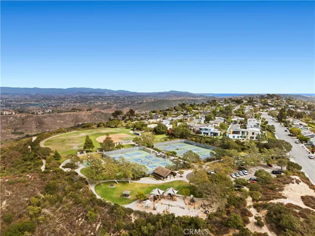 Alta Laguna Park with breathtaking views, tennis and pickleball courts, sports fields, and a playground.