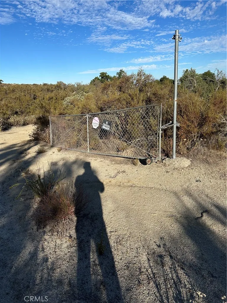 Gate by entrance to the parcel.
