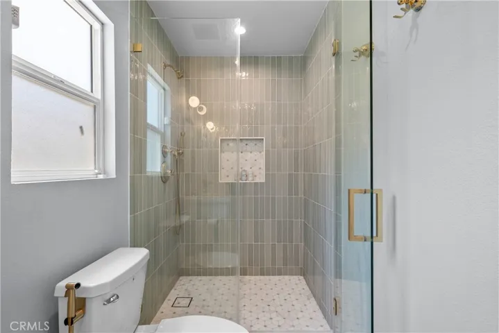 Primary Bathroom with gorgeous custom walk in shower