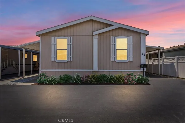 Front of home at sunset .staged digitally