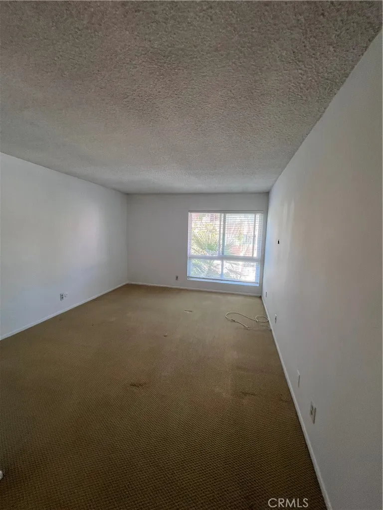 Primary bedroom with walk-in closet