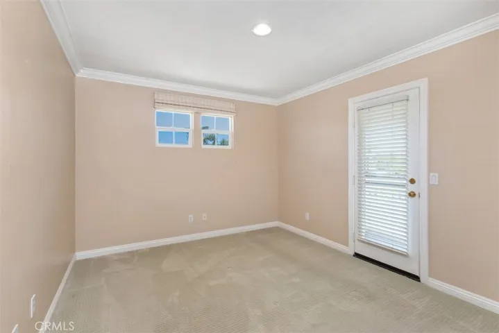 One secondary bedroom has a balcony