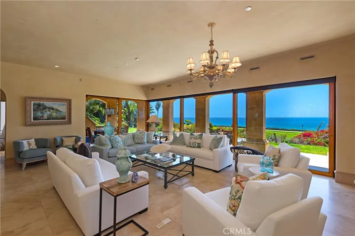 Family room sliding doors open back on both sides creating open room feel.