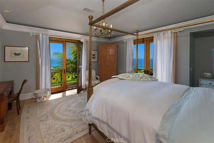 Guest Bedroom also with spectacular ocean views.  Porch doors can be opened for the breeze.   Enjoy Catalina views and spectacular sunsets.  Watch surfers.