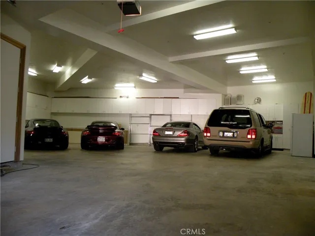 Garage holds 4-6 cars, subterranean.
