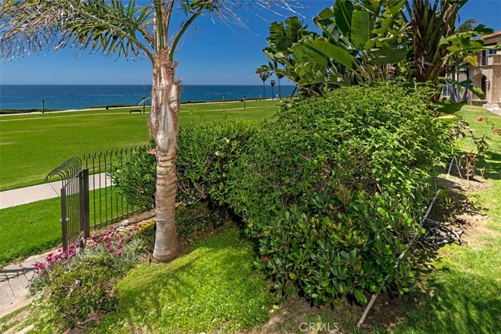 Private gate to walk out to the park and the beach path at far end of property.  Gate locks with special key.