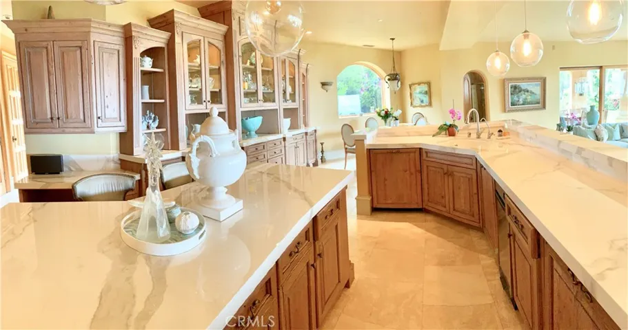 Great for entertaining.  People hang around the island and family room!