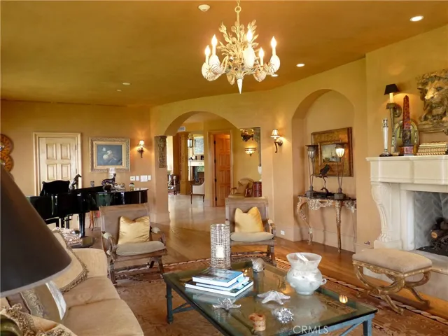 Formal Living room looking back towards large office and Dining area