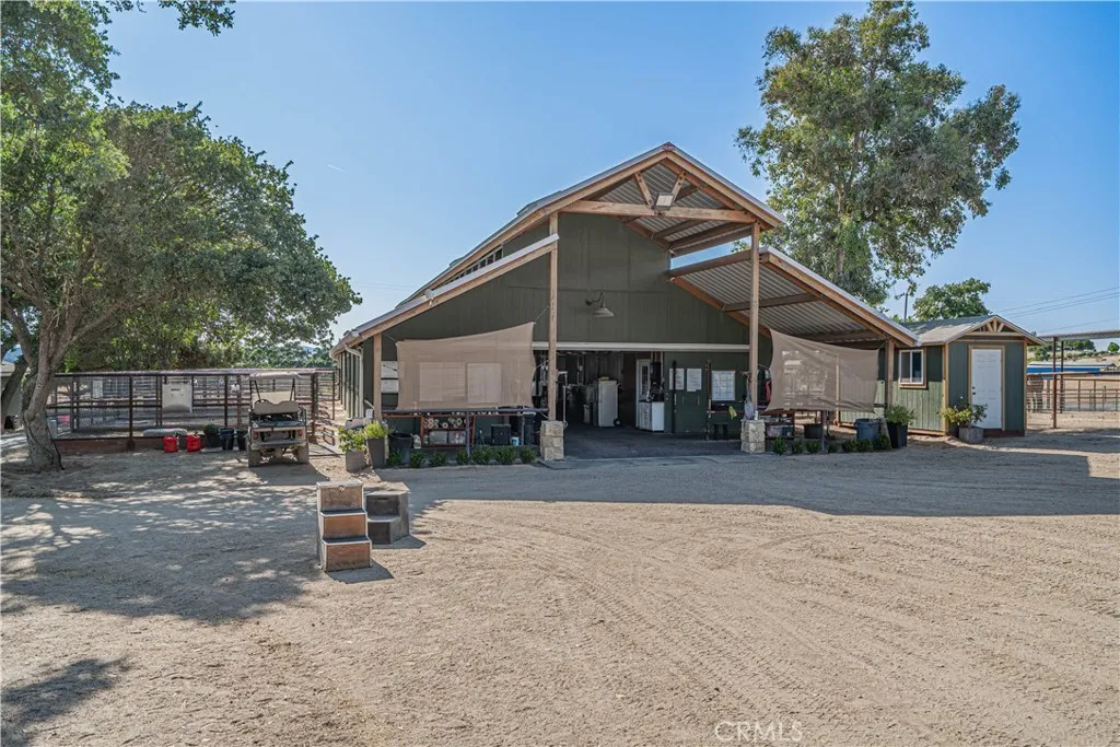 2,000 sq. ft. of serious equestrian style — 10-stall barn + bonus 6-stall barn.