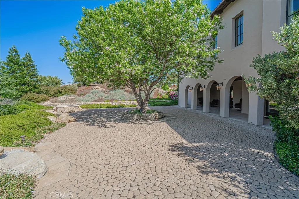 A secluded area designed for quiet relaxation and stunning property views.