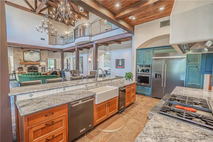Custom cabinetry and gleaming granite countertops elevate the kitchen with timeless style and sophistication.