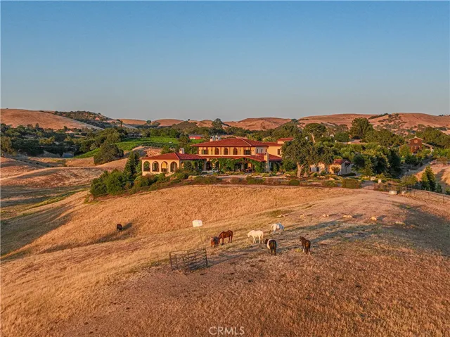 This property is beautifully embraced by the iconic golden hills that define the Templeton landscape.