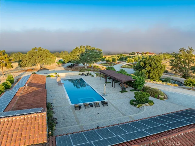A guest house like no other — complete with a luxurious poolside retreat featuring a 8 person sauna, an 8 person hotel-style steam room, and a dedicated workout room.