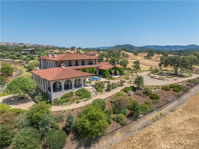 Gorgeous paved walkways lead to the lower level of the home, just steps from the theatre, bar, and wine cellar.