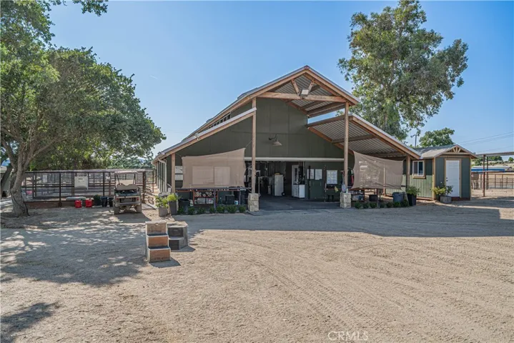 2,000 sq. ft. of serious equestrian style — 10-stall barn + bonus 6-stall barn.
