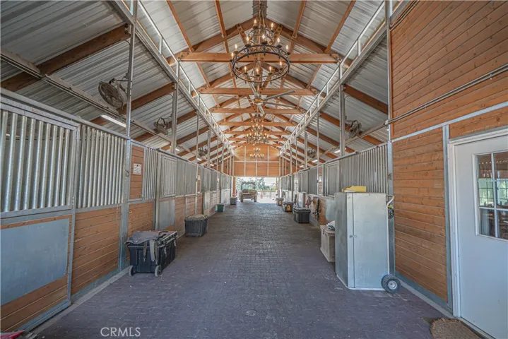 Admire the custom-made chandeliers to add a touch of elegance as well as the powerful "Big-Ass Fans" (brand) providing both functionality with high-end sophistication.