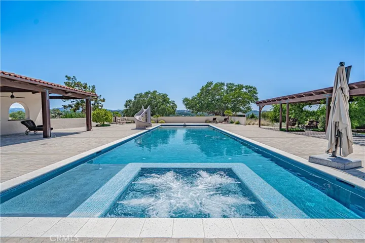 Enjoy the best of both worlds with a spa built directly into the pool — perfect for unwinding after a swim.