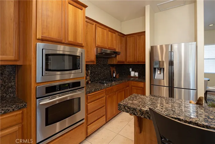 Stainless steel appliances throughout the kitchen.