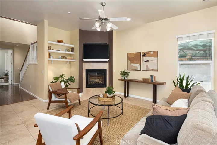 The family room has shelving and additional space for games, books and computer equipment.