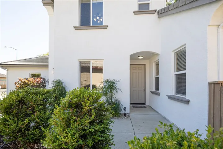 Welcome to the front entrance to 4150 La Posada five bedroom and three bathroom home in the center of a cudesac.