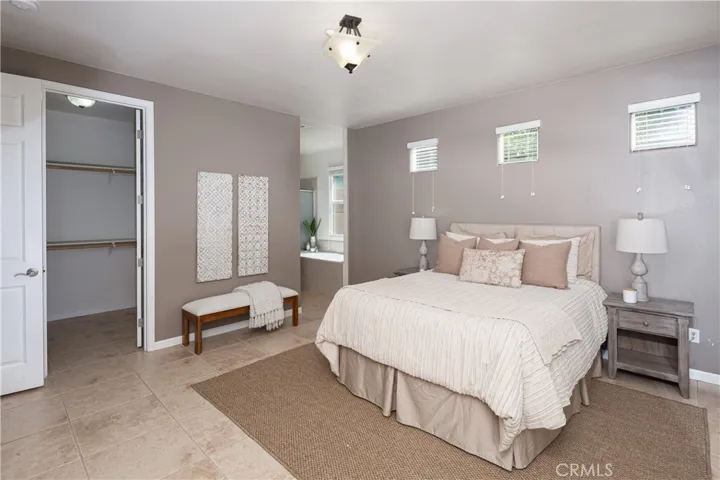 Primary bedroom downstairs with a walk-in closet.