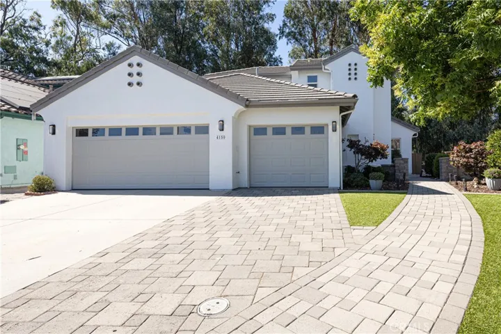 4150 La Posada has an abundance of parking in the front and the private backyard looks over open space with a creek running through it.