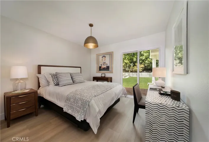 First floor bedroom with added slider to backyard