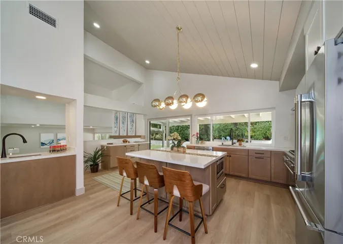 Vaulted wood ceilings and walnut cabinetry