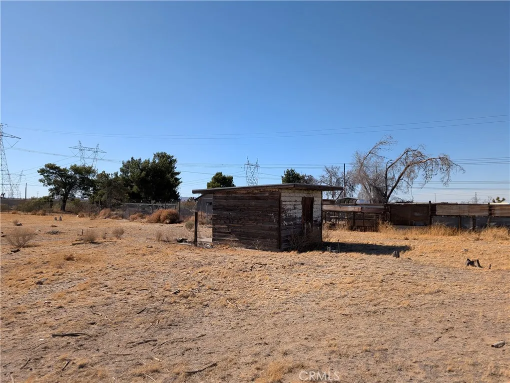 view of shed and neighbor's property to the north