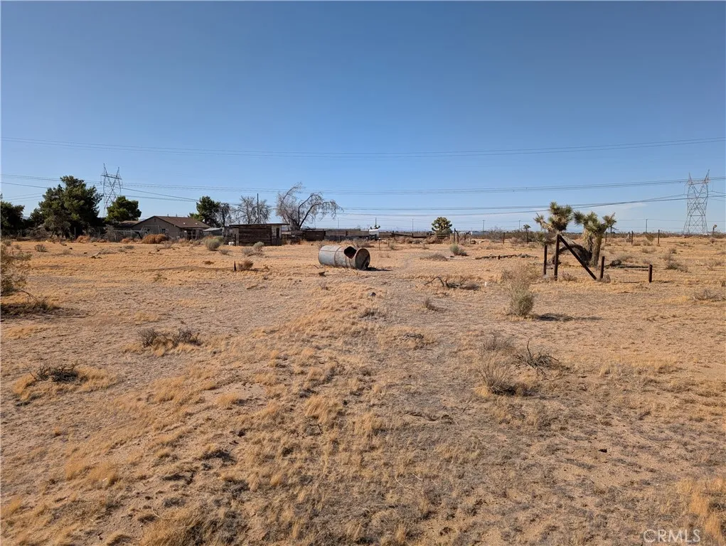 view of the lot and neighbor to the north