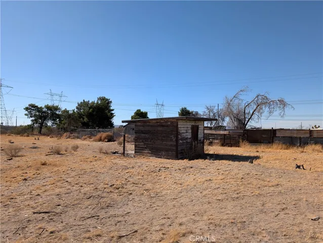 view of shed and neighbor's property to the north