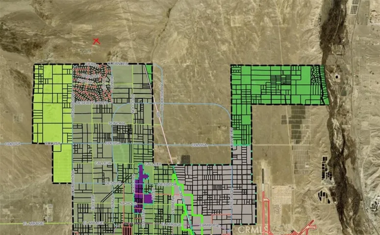 red "x" shows location and city limits to the south zoomed out more view