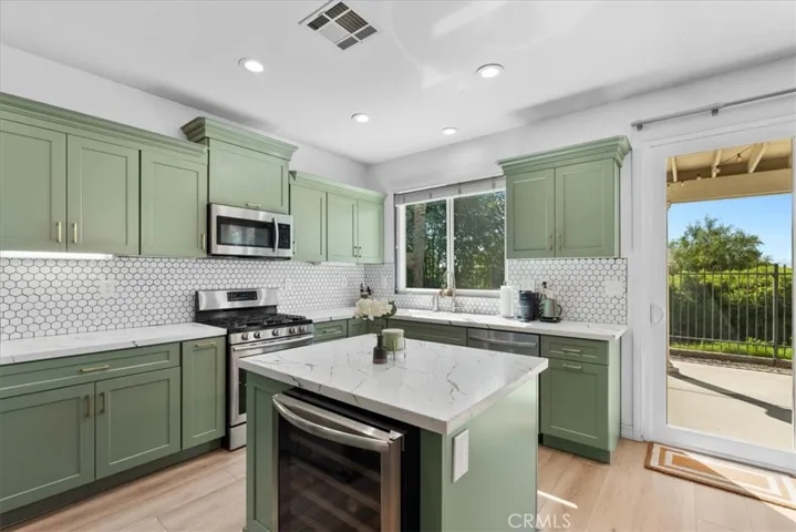 Kitchen island with wine fridge