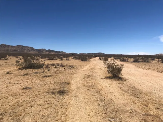 View looking east from your southern boundary. Great access road. Does not require AWD or 4WD.