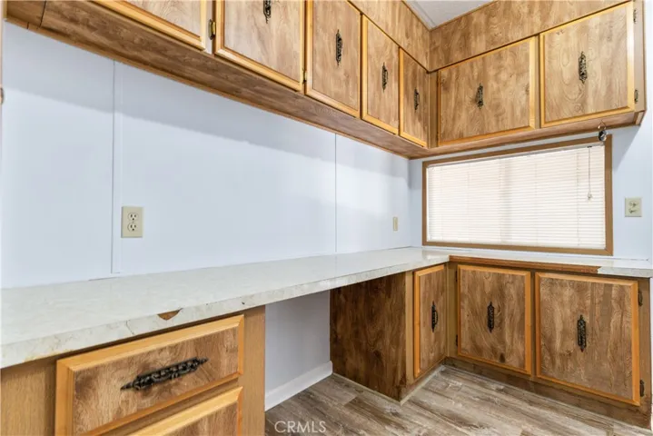 huge laundry room with an abundance of extra storage.