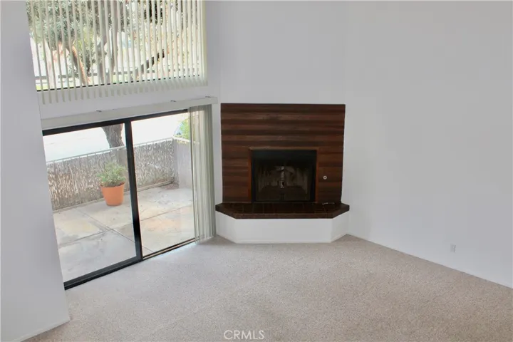 Fireplace with sliders to front patio