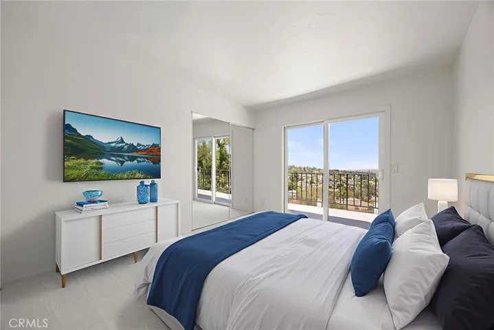 Upstairs Bedroom #1 with a view and balcony
