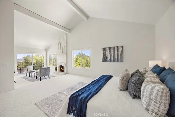 Main Suite with sitting area and fireplace