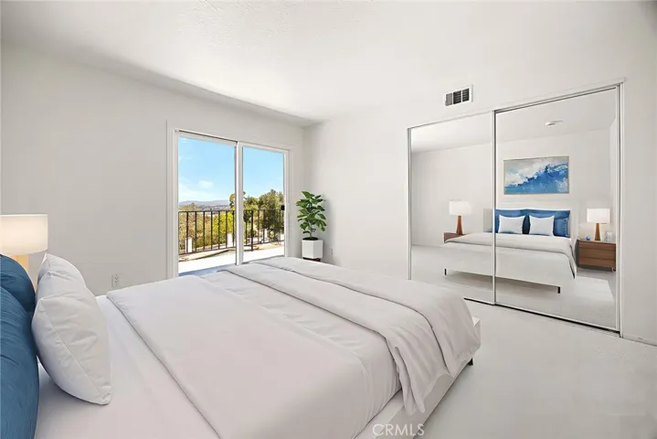 Upstairs Bedroom #2 with a view and balcony