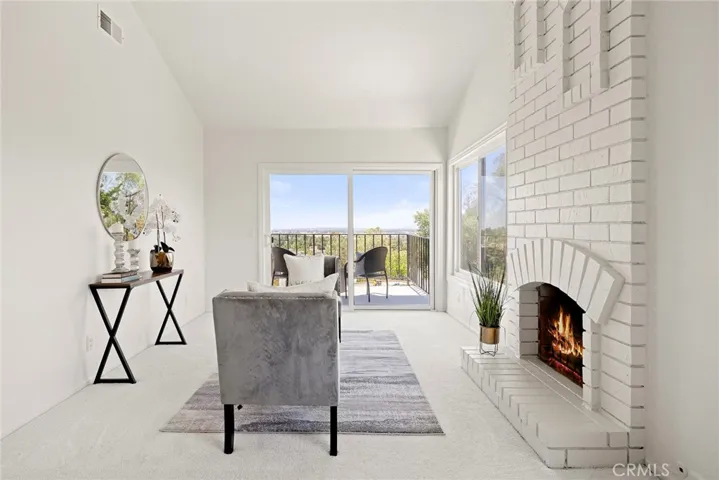 Main Suite sitting area with gas fireplace