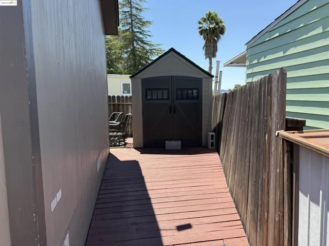 Wooden terrace with a storage unit