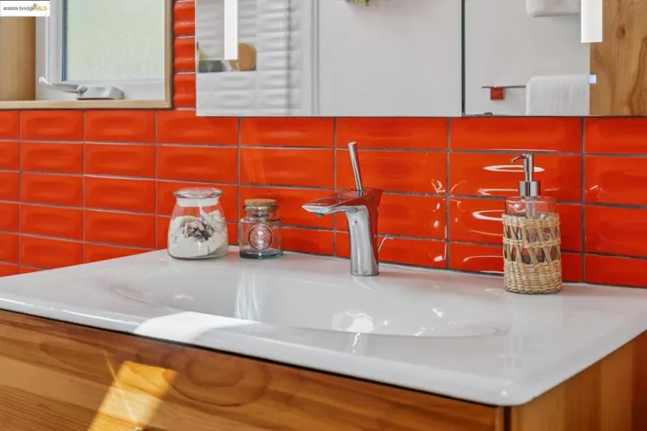 Bathroom view of vanity and backsplash