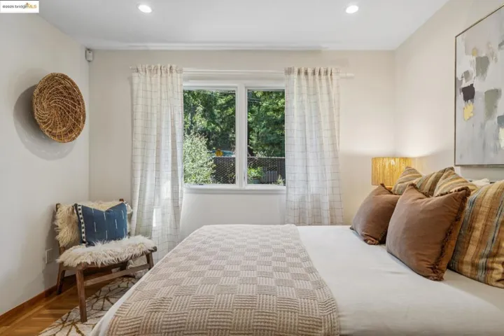 Bedroom featuring recessed lighting and baseboards