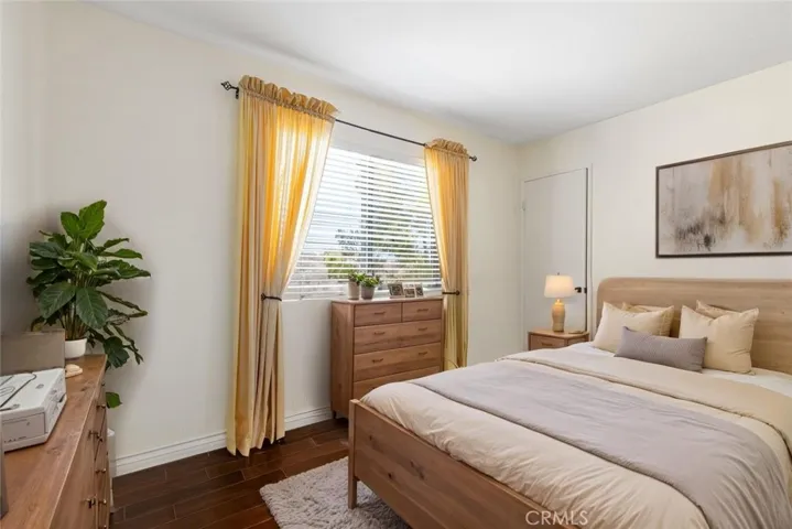 Virtually Staged bedroom upstairs. Virtual staging for all drapes