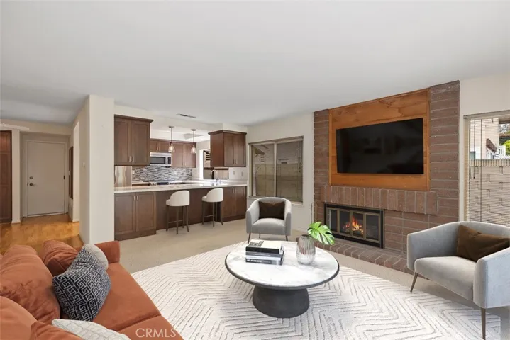 Open floor plan with the remodeled kitchen & family room.
Note: This room is virtually stagged.