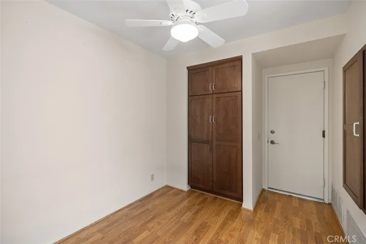 Kitchen nook area with cabinets & direct garage access door.