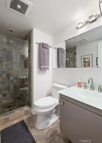 Main Level remodeled 3/4 bath with step in shower