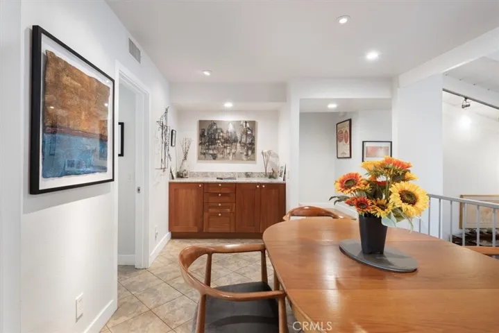Dining room with convenient built in dry bar