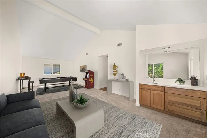 Virtually Staged Bonus Room: Virtually staged as an entertainment area with couch, tables and pool table.